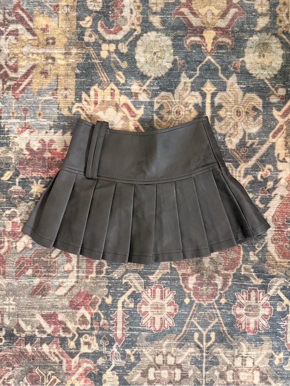 Pleated Black Leather Mini Skirt